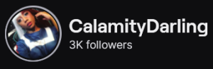 CalamityDarling's Twitch logo and follower count (3k). Logo is a picture of a black person with long white and red hair, wearing a blue jumpsuit with white designs. It's a Todoroki from My Hero Academia cosplay.
Image links to CalamityDarling's Twitch page.