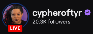 CypherOfTyr's Twitch logo and follower count (20.3k). Logo is a picture of a black woman with long black locs with red tips. Image links to CypherOfTyr's Twitch page.