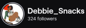Debbie_Snacks' Twitch logo and follower count (324). Logo is a full body cartoon style picture of a black woman, with red and black afro puffs, sitting with her legs crossed at the knees. Image links to Debbie_Snacks' Twitch page.