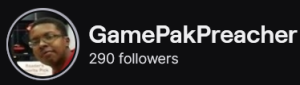 GamePakPreacher's Twitch logo and follower count (290). Logo is a picture of a black man with glasses, wearing a red shirt. Image links to GamePakPreacher's Twitch page.