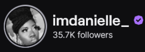ImDanielle_'s Twitch logo and follower count (35.7k). Logo is a black and white photo of a black woman wearing a black headwrap.
Image links to ImDanielle_'s Twitch page.
