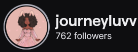 JourneyLuvv's Twitch logo and follower count (762). Logo is cartoon style picture of a black person (femme presenting) wearing a punk princess style dress with pink bunny ears. Image links to JourneyLuvv's  Twitch page.