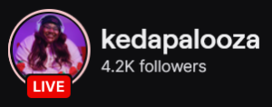 Kedapalooza's Twitch logo and follower count (4.2k). Logo is a picture of a smiling black woman with a pink sweater, long brown hair, and lilac colored headphones. Image links to Kaedapalooza's Twitch page.
