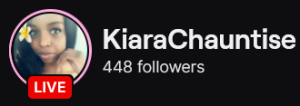 KiaraChauntise's Twitch logo and follower count (448). Logo is a picture of a black woman with her long curly hair swept to the left side, and a yellow flower in her hair. Image links to KiaraChauntise's Twitch page.
