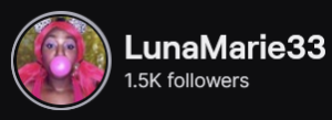LunaMarie33's Twitch logo and follower count (1.5k). Logo is a picture of a black woman with pink ponytails blowing a pink bubblegum bubble. Image links to LunaMarie33's Twitch page.
