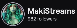 MakiStreams' Twitch logo and follower count (982). Logo is a picture of a black woman with green skin and long green hair, with golden eyeshadow around her eyes. It's a Gamora (Marvel comic character) cosplay. Image links to MakiStreams' Twitch page.
