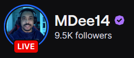 MDee14's Twitch logo and follower count (9.5k). Logo is a picture of a black man wearing a blue hoodie and black headphones. Image links to MDee14's Twitch page.
