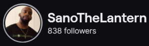 SanoTheLantern's Twitch logo and follower count (838). Logo is a picture of a bald black man with a full beard and wearing a black t-shirt.
Image links to SanoTheLantern's  Twitch page.
