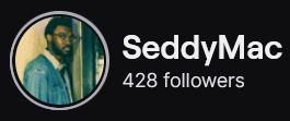 SeddyMac's Twitch logo and follower count (428). Logo is a picture of a black man wearing glasses and a jean jacket while leaning against a door frame. Image links to SeddyMac's Twitch page.
