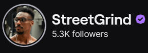 StreetGrind's Twitch logo and follower count (5.3k). Logo is a picture of a black man with glasses, mustache and goatee looking o the left. Image links to StreetGrind's Twitch page.
